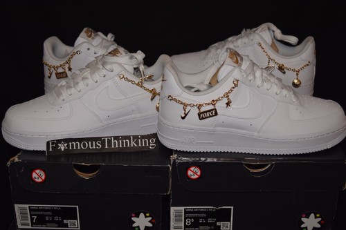 Cionondoli Nike Air Force 1 LX oro metallizzato ciondoli fortunati WMNS DD1525 100