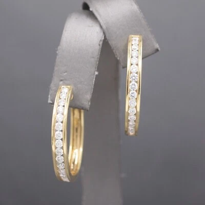 Sparkling Channel Set Diamond Oval Hoop Earrings in 14k Yellow Gold 1.95cttw - Image 1 of 4