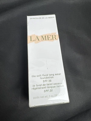 Base de maquillaje La Mer The Soft Fluid Long Wear 1 oz/30 ml FPS 20 - Marfil 01 VENDEDOR DE EE. UU. Foto 1 de 3