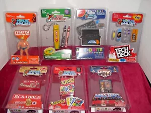 7 NEW World's Smallest Stretch Armstrong Tech Deck Uno Lite Brite Scrabble - Picture 1 of 5