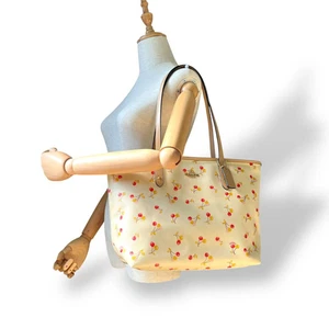 COACH City Zip Tote Ivory PVC Shoulder Bag Cherry Print Red Yellow Gold Logo - Picture 1 of 20