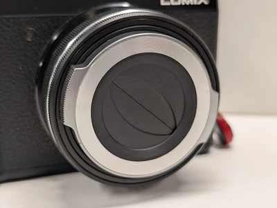 Tapa de lente automática Olympus LC-37C SLV para M.Zuiko 14-42 mm F3,5-5,6 EZ plateada genuina Foto 1 de 4