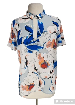 Top floral básico GUESS para mujer talla M cuello con agujero de llave manga corta acampanada 115A Foto 1 de 4