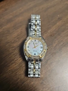 Reloj Citizen Eco-Drive 26mm WR100 Dos Tonos Acero Inoxidable Fecha Mujer 7.25" - Imagen 1 de 6