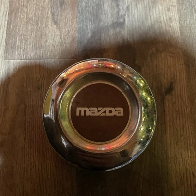 MAZDA B2200 1987-1993 Pick Up Truck Wheel Center Cap OEM USED - Image 1 of 3