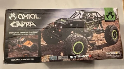 Axial 1/18 UTB18 Capra 4WD Unlimited Trail Buggy RTR with Battery Charger - Image 1 of 4