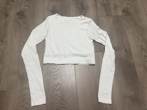 Top corto acanalado manga larga Lululemon Ebb To Street talla 4 blanco sin almohadillas - Imagen 1 de 7