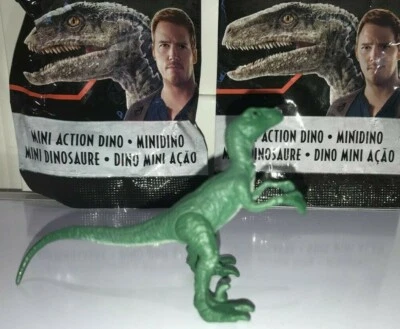 BOLSO FIGURA DINOSAURIO ACCIÓN MINI MUNDO JURÁSICO VERDE VELOCIRATOR SELLADO NUEVO  Foto 1 de 3