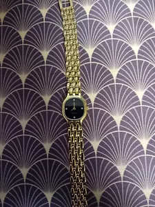 Tissot Stylist Damenuhr E242 vergoldet,schwarzes Zifferblatt mit Diamantmarkern - Bild 1 von 5
