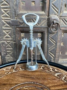 Abridor de corcho de botella de vino de metal cromado de colección brazo oscilante italiano alado - Imagen 1 de 9