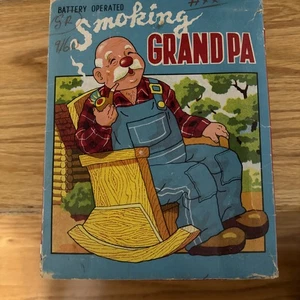 Giocattolo di latta FUMATORE nonno a batteria VINTAGE anni 50 funzionante - Foto 1 di 2