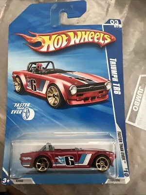 Triumph TR6 2010 Hot Wheels Faster Than Ever rojo 3 de 10 ruedas doradas de 5 radios #6 Foto 1 de 4