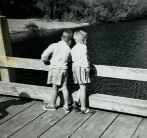 Two Boys Looking Over Rail At Water B&W Photograph 3.5 x 5 - Picture 1 of 3