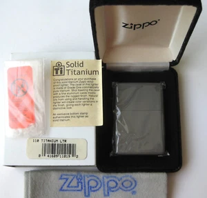 ZIPPO PREVIOUSLY COLLECTED Not Used SOLID TITANIUM Lighter 2003 Claim Shell Box - Picture 1 of 5