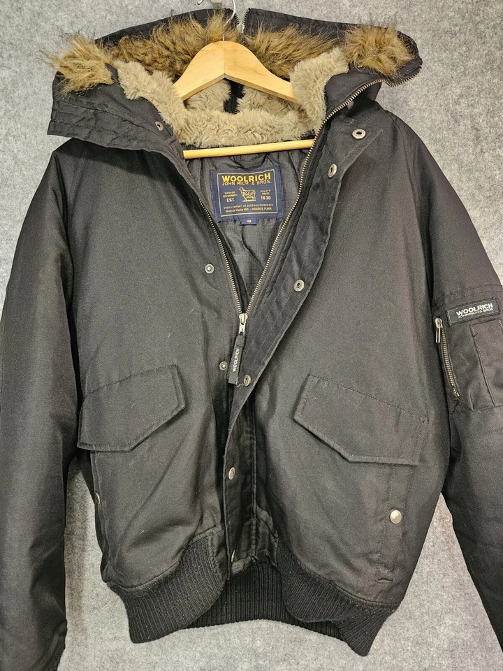 Chaqueta de bombardero Woolrich John Rich & Bros para hombre 48 Arctic Parka capucha de piel sintética negra Foto 1 de 4