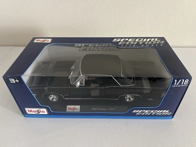 Maisto 1965 Pontiac GTO Black 1:18 Diecast Car - Image 1 of 3