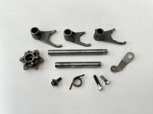 #2 USED OEM 87-04 KAWASAKI MOJAVE 250 TRANS GEAR SHIFT CHANGE FORKS & PARTS ASSY - Picture 1 of 4