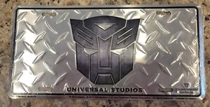 NUOVO UNIVERSAL STUDIOS AUTOBOTS TRANSFORMERS THE RIDE 3-D TARGA METALLO R14 - Foto 1 di 2