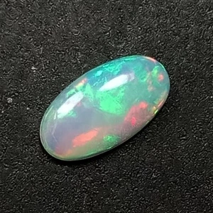 0.94Cts_Llamativadora piedra preciosa de ópalo blanco ovalada multicolor 100 % natural M244 - Imagen 1 de 4