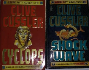 Lot Of 2 Clive Cussler PB Books PreOwned - Picture 1 of 8