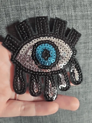 Aplique de globo ocular de lentejuelas 3"x 4,5" para planchar Foto 1 de 3