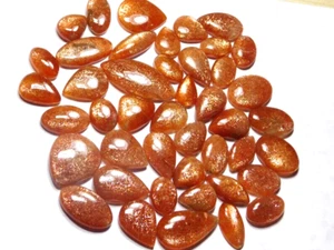 Increíble lote al por mayor de piedras solares naranja natural cabujón piedras preciosas sueltas sin tratar - Imagen 1 de 7