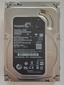 ST2000DM001, SN: W8E, WU, PN: 1ER164-044, FW: AQ03, 16115, Seagate 2Tb 3.5" HDD - Imagen 1 de 2