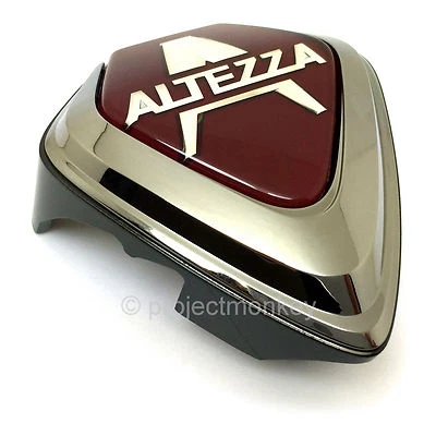 OEM Toyota 00-05 Lexus IS300 Parrilla Delantera Emblema Altezza Insignia Roja Genuina JDM Foto 1 de 2