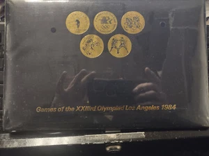 1984 Olympics Games Of The XXIIIrd Olympiad Los Angeles Token Coin Set 24 Sealed - Picture 1 of 4