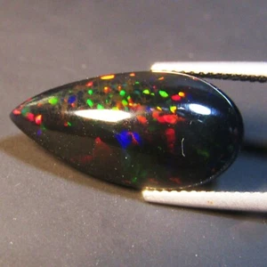 Piedra preciosa natural multicolor de 5,64 quilates con forma de pera de ópalo negro de Etiopía - Imagen 1 de 6