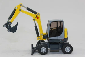 Siku 3560 Wacker Neuson EW 65 Mobilbagger mit Tieflöffel 1:50 Bagger NEU in OVP - Bild 1 von 10