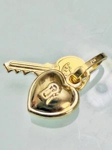 Delicato ciondolo cuore chiave oro giallo puro 18 kt 750 regalo carino - Foto 1 di 10