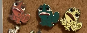 3 Stück Disney Darsteller Pascal Pins gelb orange grün - Bild 1 von 1