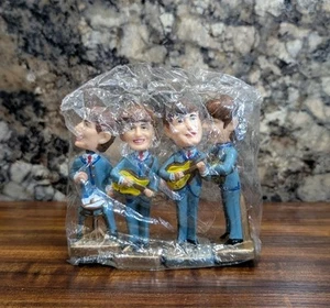 New Vintage The Beatles 4-inch Cake Toppers Bobble Head Set 1964 Sealed Bag - Picture 1 of 4