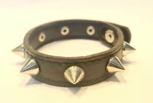 Leather bracelet with studs. Black jewel with silver spikes. Length 20 CM