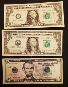 Federal Reserve Notes (3) with raised serial number missprint: $5 and two $1 - Picture 1 of 5