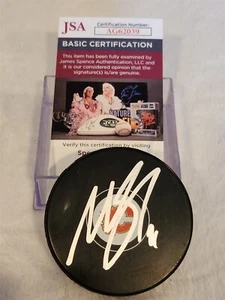 MIKAEL BACKLUND signed FLAMES puck JSA COA - Picture 1 of 2