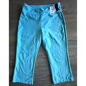 Pantalones de yoga recortados Nike Dri-FIT azul aguamarina ropa deportiva elástica para mujer M (8-10) - Imagen 1 de 8