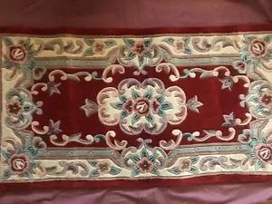 New Hand made Oblong 100% Wool rug.Main colour Red. 29in x 58in approx. - Picture 1 of 8