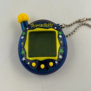 Tamagotchi Connection V4 Bandai Transparent Blau/Gelb Sterne - Bild 1 von 4