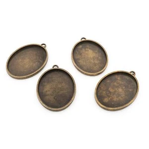Vintageparts schlichte Fassungen für 40 x 30 mm Cabochons in antik Bronzefarben - Bild 1 von 4