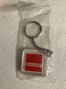 SHARP Elektronik Schlüsselanhänger - Bild 1 von 6