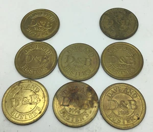 8 VINTAGE DAVE & BUSTER'S GAMING TOKENS 1995 1996 2005 2009 & UNKNOWN YEAR - Picture 1 of 1