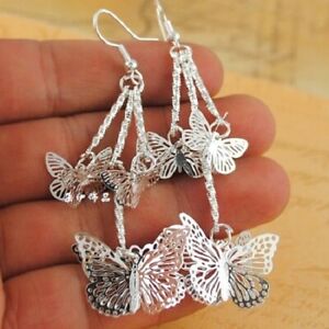  Super lovely silver tone cutout butterfly chandelier earrings 