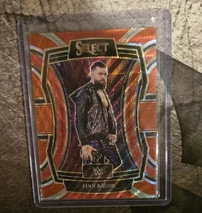 2024 Panini Select WWE - Phenomenon Finn Balor #17 Red Wave Prizm /149 - Picture 1 of 2