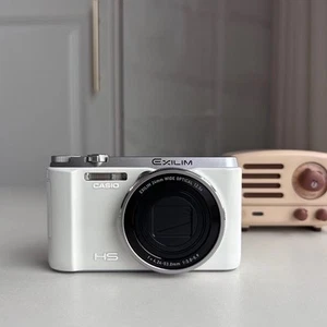Casio EX-ZR1000 Digital Camera 16.1 MP 12.5x Optical Zoom Flip Screen White - Picture 1 of 7