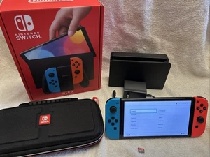Nintendo Switch OLED Model HEG-001 Handheld 64GB - Black/Red/Blue - Adult Owned - Picture 1 of 7