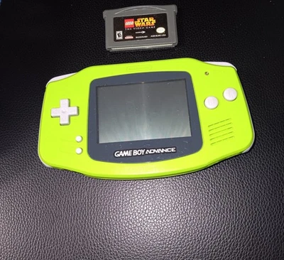 Sistema portátil Nintendo Game Boy Advance verde kiwi probado por GBA AGB-001 - 1 juego Foto 1 de 4