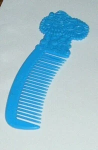 1988 peine de plástico vintage para niños alevines azules - Imagen 1 de 1