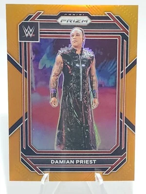 2023 PANINI PRIZM WWE PRIZMS ORANGE #143 DAMIAN PRIEST /99 PARALLEL - Image 1 of 2